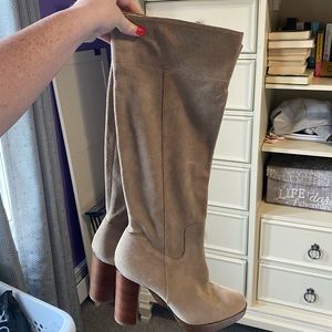 Worn, women’s size 8 1/2 suede boots. Approx 3 1/2 inches tall.